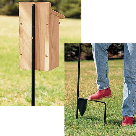 Duncraft Bluebird Move-A-Round Feeder & Pole showing a wooden birdhouse on a black metal stake with foot lever for easy lawn installation.